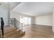 Bright living area with staircase, neutral walls, and sliding door to patio at 1134 E Driftwood Dr, Tempe, AZ 85283
