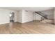 Large living room with wood floors, staircase and bright, neutral paint at 1134 E Driftwood Dr, Tempe, AZ 85283