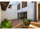 Private patio with flagstone, sliding glass doors and lush foliage at 1134 E Driftwood Dr, Tempe, AZ 85283