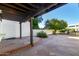 Outdoor patio with brick trim, stone flooring and overhead awning for shade and relaxation at 1134 E Driftwood Dr, Tempe, AZ 85283