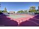 Well-maintained tennis court with green and red surface, ideal for sports and recreation at 1134 E Driftwood Dr, Tempe, AZ 85283