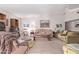 Bright living room features neutral tones, a ceiling fan, and a vaulted ceiling at 116 E Helena Dr, Phoenix, AZ 85022