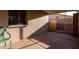 Enclosed patio features a brick wall and concrete flooring at 116 E Helena Dr, Phoenix, AZ 85022