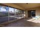 Screened-in patio provides outdoor living and access to the backyard at 116 E Helena Dr, Phoenix, AZ 85022
