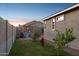 Green backyard with above ground pool, seating, fire hydrant and mature landscaping at 12176 E Chevelon Trl, Gold Canyon, AZ 85118