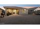 Charming backyard with covered patio, gravel landscaping, and space for outdoor living and dining at 12176 E Chevelon Trl, Gold Canyon, AZ 85118