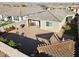 Spacious backyard with gravel landscaping, a covered patio, and mountain views, perfect for outdoor entertaining at 12176 E Chevelon Trl, Gold Canyon, AZ 85118