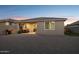 Covered patio and backyard featuring desert landscaping and block wall at 12176 E Chevelon Trl, Gold Canyon, AZ 85118