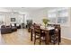 Inviting living room with natural light, wood floors, and cozy seating area at 12176 E Chevelon Trl, Gold Canyon, AZ 85118