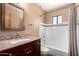 Updated bathroom features granite counters and subway tile in the shower at 12811 N 44Th Dr, Glendale, AZ 85304