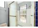 The bathroom features a glass enclosed shower with a block window at 12811 N 44Th Dr, Glendale, AZ 85304