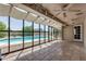 Enclosed patio with tile floors and view of the backyard pool at 12811 N 44Th Dr, Glendale, AZ 85304