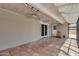 Enclosed patio with tile floors, ceiling fans and access to the backyard at 12811 N 44Th Dr, Glendale, AZ 85304