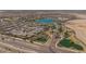 Expansive aerial view showcasing the community layout, lakes, and well-planned residential areas at 17179 S 174Th S Dr, Goodyear, AZ 85338
