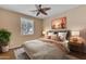 Serene bedroom featuring a plush bed, stylish nightstands, and a beautiful painting, creating a relaxing retreat at 17179 S 174Th S Dr, Goodyear, AZ 85338