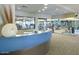 Community gym with various exercise equipment, mirrors, and ample lighting at 17179 S 174Th S Dr, Goodyear, AZ 85338