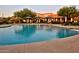 Inviting community pool with comfortable seating areas, ideal for enjoying sunny days at 17179 S 174Th S Dr, Goodyear, AZ 85338