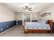 Comfortable bedroom featuring plush carpeting, neutral paint and a view from the window at 17363 W Lisbon Ln, Surprise, AZ 85388