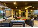 Spacious covered patio features comfortable seating and an outdoor dining area, perfect for entertaining at 17363 W Lisbon Ln, Surprise, AZ 85388