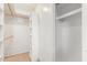 Spacious closet includes shelves, storage cabinets, and hanging rods for a clutter-free and organized living space at 18402 N 17Th Ave, Phoenix, AZ 85023