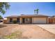 Charming single-story home features a two-car garage and low-maintenance front yard at 18402 N 17Th Ave, Phoenix, AZ 85023