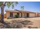 Charming single-story home features a two-car garage and low-maintenance front yard at 18402 N 17Th Ave, Phoenix, AZ 85023