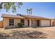 Charming single-story home features a two-car garage and low-maintenance front yard at 18402 N 17Th Ave, Phoenix, AZ 85023