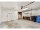 Garage space with shelving, utility storage, and an attached garage door opener at 18402 N 17Th Ave, Phoenix, AZ 85023