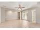 Cozy living room with recessed shelving and sliding door access to pool provides relaxation and natural light at 18402 N 17Th Ave, Phoenix, AZ 85023