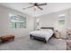 Relaxing bedroom with ample natural light and neutral tones at 18808 W Solano Dr, Litchfield Park, AZ 85340