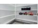 Walk-in pantry featuring adjustable shelving to maximize storage space at 18808 W Solano Dr, Litchfield Park, AZ 85340