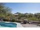 Inviting backyard featuring a pool and view of the desert at 18873 N 94Th Way, Scottsdale, AZ 85255