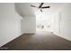 Large bedroom with neutral carpeting, natural light, and vaulted ceiling at 18873 N 94Th Way, Scottsdale, AZ 85255