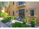 Secluded backyard patio with lush landscaping and lounge chairs at 18927 N 101St St, Scottsdale, AZ 85255