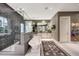 Elegant bathroom featuring soaking tub, walk-in shower, dual vanities, and stylish decor at 18927 N 101St St, Scottsdale, AZ 85255