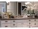 Bathroom vanity with ample cabinet space, granite countertops, and decorative accents at 18927 N 101St St, Scottsdale, AZ 85255