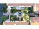 Aerial view shows the home's lush landscaping and hardscaping, as well as the fountain at the front entrance at 18927 N 101St St, Scottsdale, AZ 85255