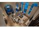 Expansive living room showcases wood floors, large windows, and chic decor for comfortable living at 18927 N 101St St, Scottsdale, AZ 85255