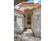 Close-up of the home's entrance, showcasing a secure screen door and the house number at 19127 N 79Th Dr, Glendale, AZ 85308