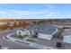 Stunning aerial view of custom home with drought-tolerant landscaping and paver driveway at 20426 E Arroyo Verde Dr, Queen Creek, AZ 85142