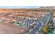 Beautiful aerial view of a neighborhood featuring backyard pools and desert landscaping at 20426 E Arroyo Verde Dr, Queen Creek, AZ 85142