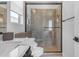 Elegant bathroom features a glass-enclosed shower with stylish tile and modern fixtures at 20426 E Arroyo Verde Dr, Queen Creek, AZ 85142