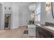 Bright bathroom showcasing a standalone tub, chandelier, vanity and modern design at 20426 E Arroyo Verde Dr, Queen Creek, AZ 85142