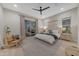 Modern bedroom with a sliding glass door offering outdoor access at 20426 E Arroyo Verde Dr, Queen Creek, AZ 85142