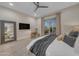 Comfortable bedroom with natural light and outdoor views at 20426 E Arroyo Verde Dr, Queen Creek, AZ 85142