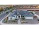 Gorgeous aerial view of custom home with desert landscaping and paver driveway at 20426 E Arroyo Verde Dr, Queen Creek, AZ 85142