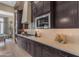 Modern kitchen featuring sleek countertops, premium appliances, and ample storage, creating a functional and stylish space at 20426 E Arroyo Verde Dr, Queen Creek, AZ 85142