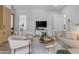 Inviting living room features a media center, comfortable seating, and an open design at 20426 E Arroyo Verde Dr, Queen Creek, AZ 85142