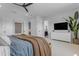 Main bedroom with large windows, ceiling fan, ensuite bathroom and ample closet space at 20426 E Arroyo Verde Dr, Queen Creek, AZ 85142