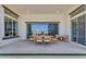 Relaxing outdoor patio with dining table and chairs, offering a seamless transition to indoor living at 20426 E Arroyo Verde Dr, Queen Creek, AZ 85142
